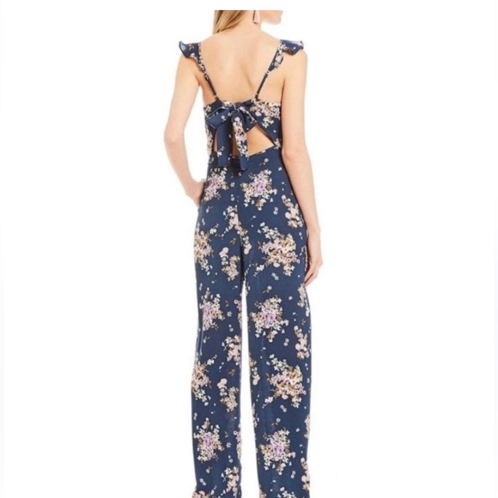 Floral Jumpsuit open back riffled Straps back tie.
